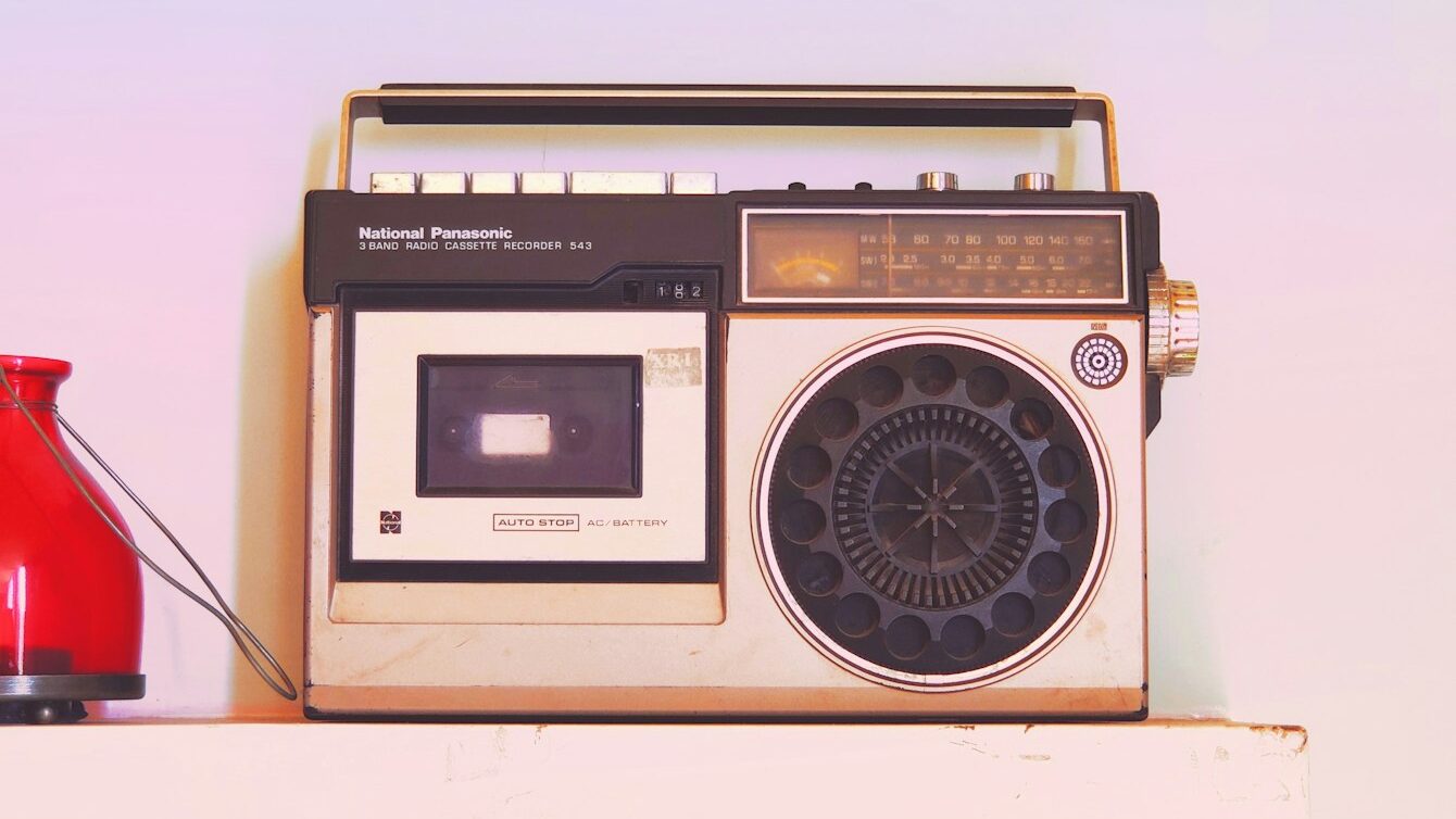 brown and black radio on white table